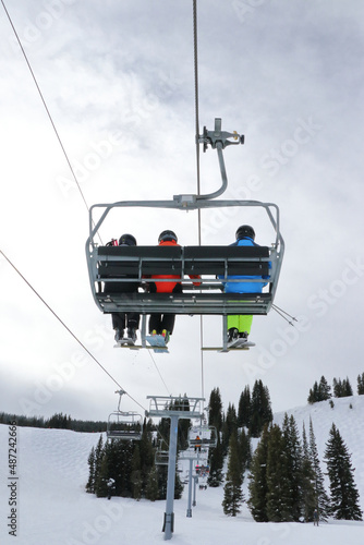 Skiers on Winter Ski Lift