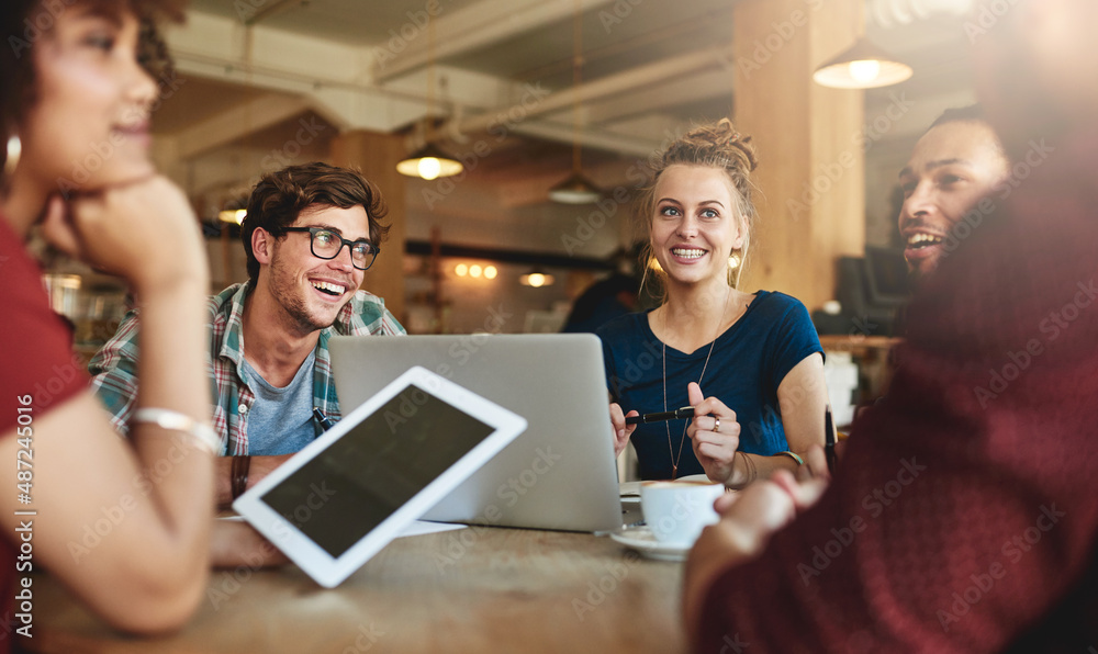 Study groups are the perfect place to find new perspectives. Shot of students studying in a coffee shop. Study groups are the perfect place to find new perspectives. Shot of students studying in a coffee shop.