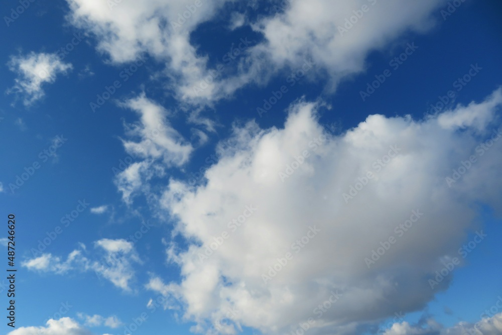 Blue sky with beautiful big fluffy cloud, natural background Blue sky with beautiful big fluffy cloud, natural background