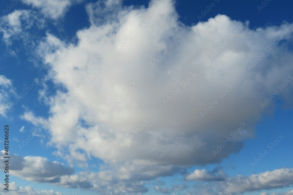Big fluffy cloud in blue sky, natural clouds background