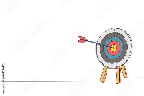 One continuous line drawing of arrow was shot bullseye to archery target board. Archery sport equipment concept. Dynamic single line draw design graphic vector illustration