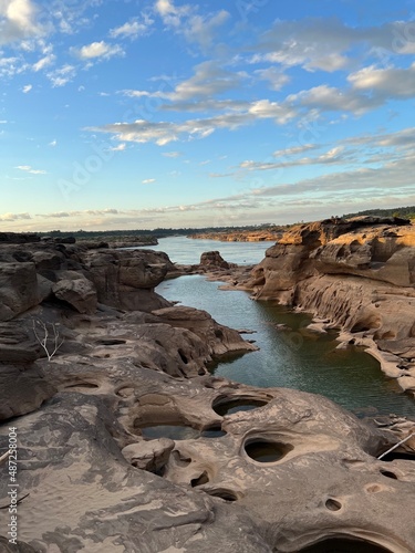 "Sam Pun Bok" Three thousand waving the rocks beneath the Mekong river. Natural sandstone group Eroded through time for thousands of years. Thailand grand canyon in Ubon Ratchathani.