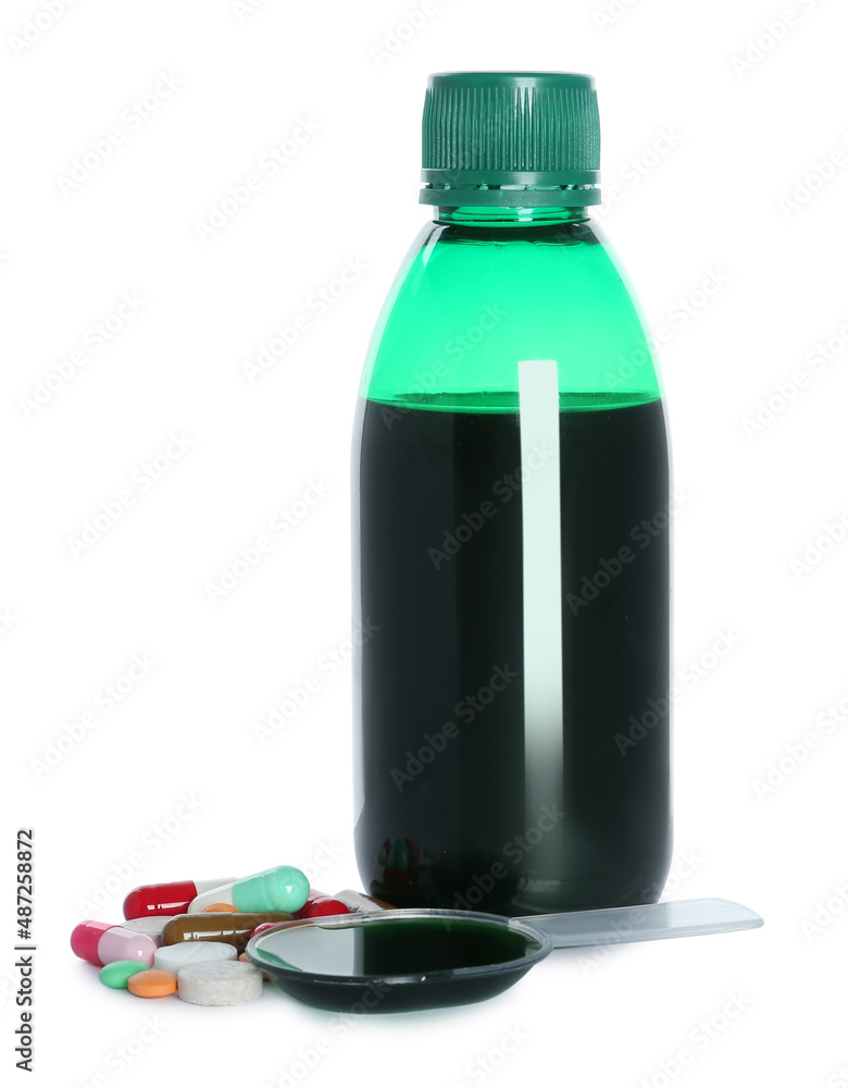 Bottle of cough syrup, dosing spoon and pills on white background Stock ...