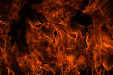 Fire flames isolated on black background. Fire burn flame isolated, flaming burning art design concept with space for text.