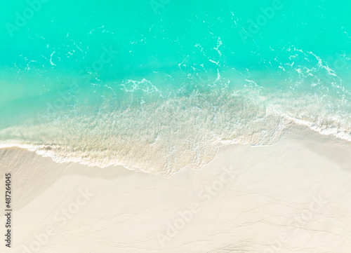 Fototapeta Naklejka Na Ścianę i Meble -  Top view of background summer beach wave water seashore sand beach -Summer pattern image