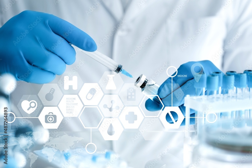 doctor with Coronavirus vaccine bottle with the blank label. Doctor preparing a dose doctor with Coronavirus vaccine bottle with the blank label. Doctor preparing a dose