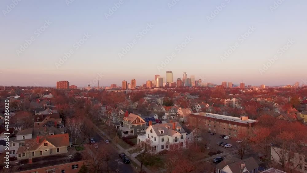 Minneapolis, Minnesota at sunset in the fall from a drone Minneapolis, Minnesota at sunset in the fall from a drone