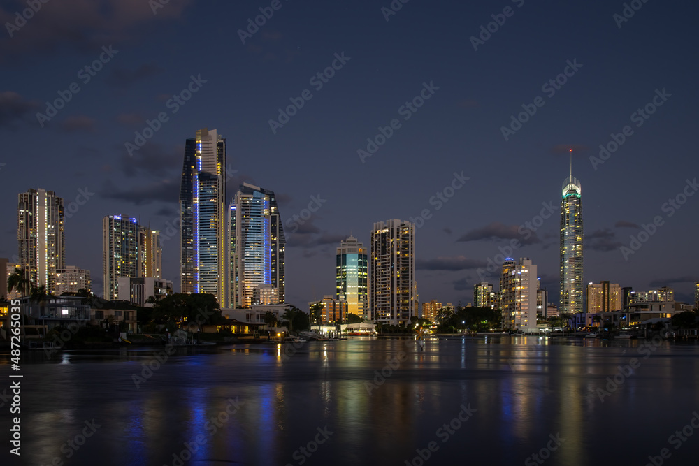 City skyline across the water in the evening