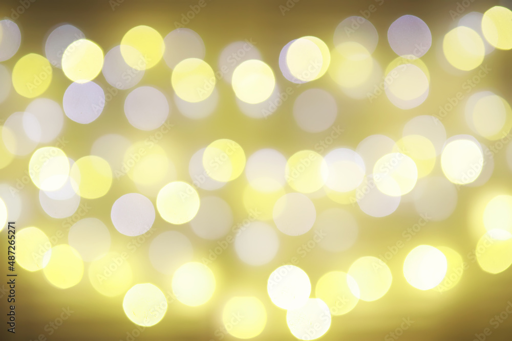 Abstract bokeh background. Golden bokeh circles on dark blue background. Layer overlay.