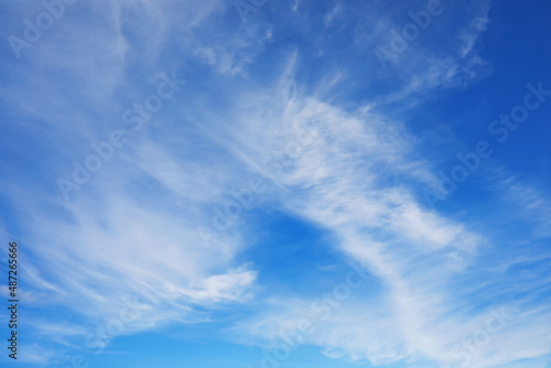 High clouds in the summer sky. Sky background. Meteorological observations of the sky. © alexkich