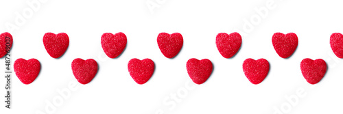 Seamless border from red marmalade hearts isolated on white background. Valentine s Day concept.