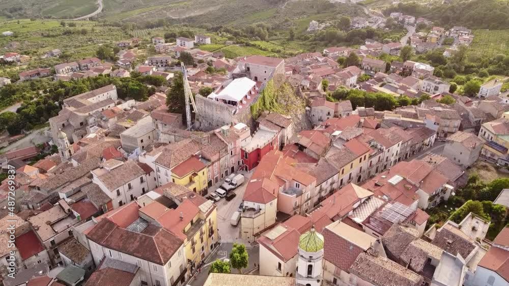 Aerial forward view of rural village in southern Italy. Guardia