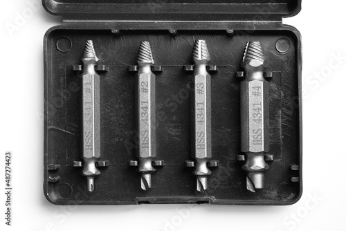 Set of drill extractor for unscrewing damaged screws. Tools for removing broken bolts. White background. top view