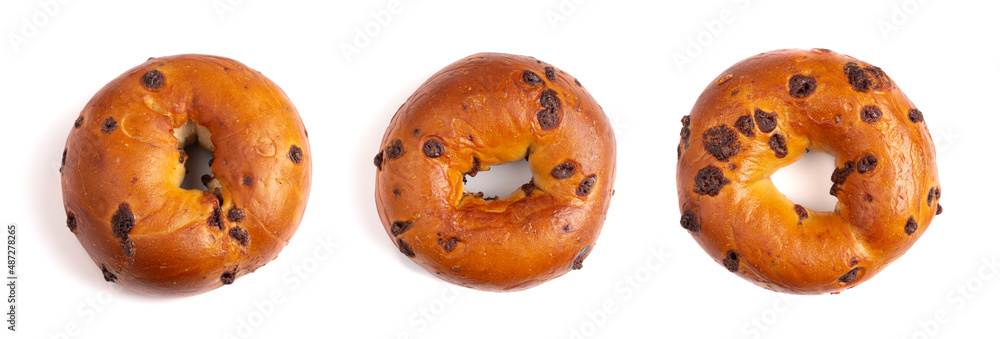 A Row of Three Chocolate Chip Bagel Isolated on a White Background A Row of Three Chocolate Chip Bagel Isolated on a White Background