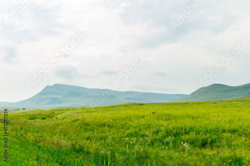 Beautiful steppe landscape: meadow, hills and sky. Khakassia, Russia. © Province_photo