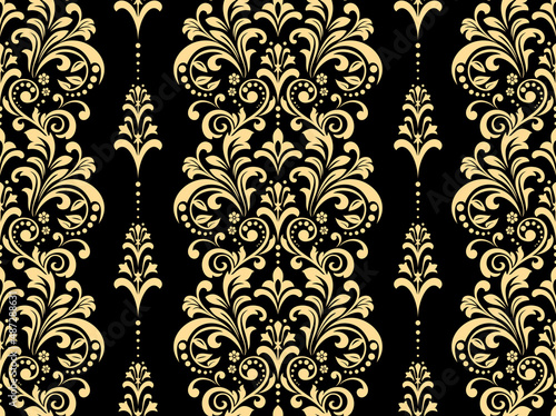 Wallpaper in the style of Baroque. Seamless vector background. Gold and black floral ornament. Graphic pattern for fabric, wallpaper, packaging. Ornate Damask flower ornament