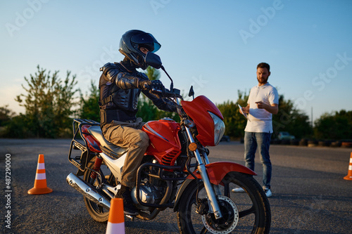 Photography Riding between cones, lesson in motorcycle school