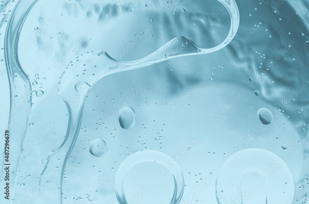 The surface of the water. An image of a drop of oil on water. Background for the design. The surface of the water. An image of a drop of oil on water. Background for the design.