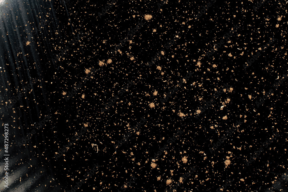 Black background with orange spots Black background with orange spots