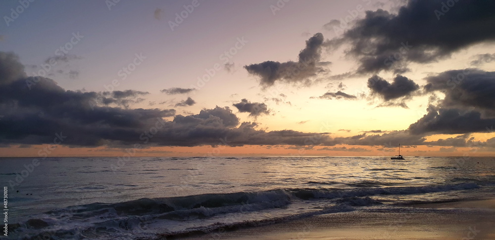 Sunrise on the Beach. Rising sun, and Atlantic Ocean