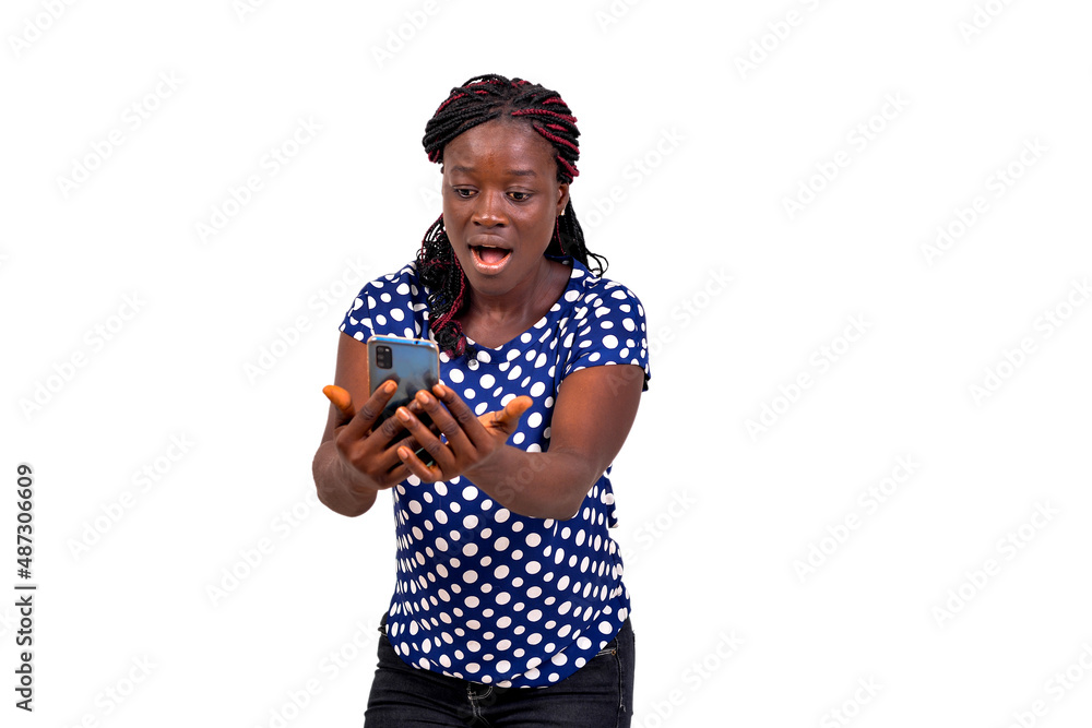 beautiful surprised young woman looking at mobile phone. beautiful surprised young woman looking at mobile phone.