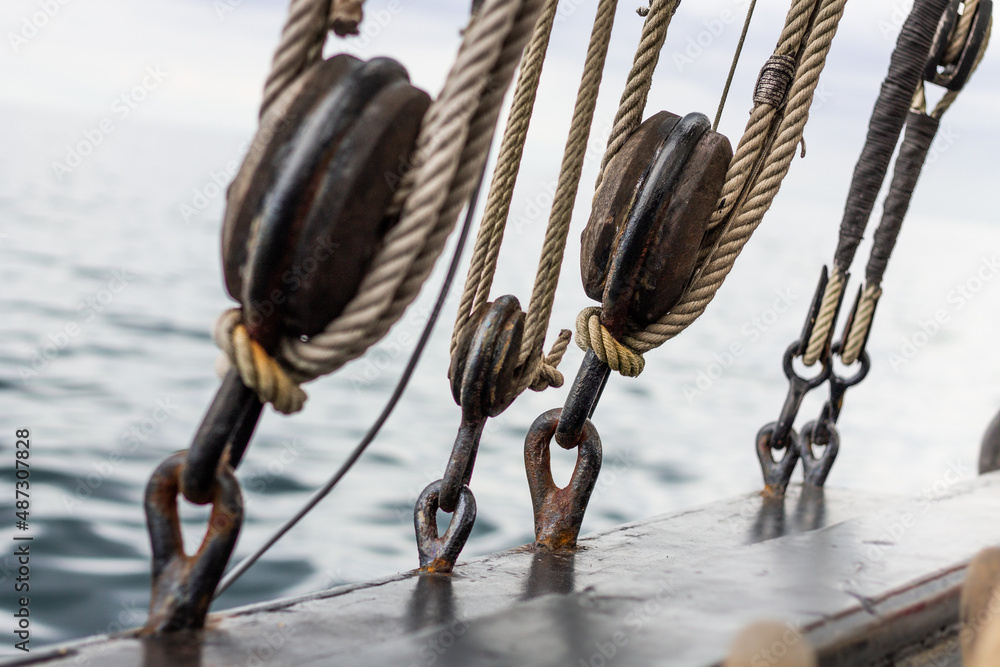 Old boat pulleys and hoists. Marine and sailing background Stock Photo