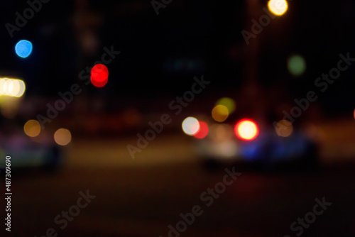 Bokeh blurred car lights at night. Abstract background