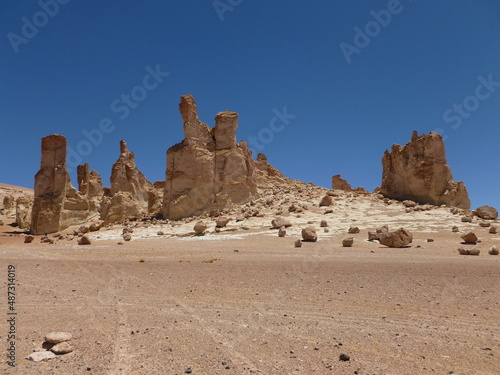 Photograph taken on a sunny day around Atacama desert region at Chili, showing the architecture and colours of this historical place. Rocks formation, lagoons, fauna and geysers.