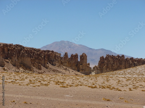 Photograph taken on a sunny day around Atacama desert region at Chili, showing the architecture and colours of this historical place. Rocks formation, lagoons, fauna and geysers.