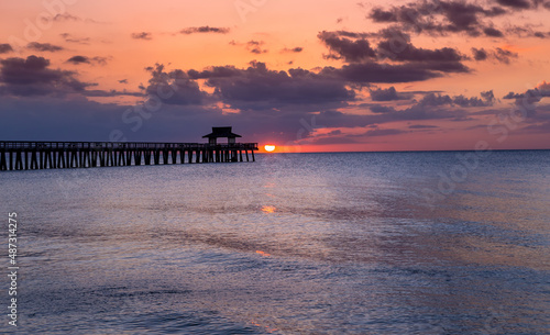 pier jetty at sunset in Naples  forida  usa