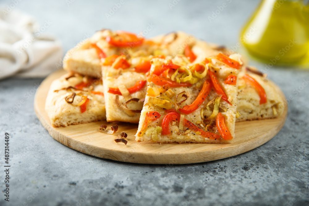 Traditional homemade focaccia bread with red pepper Traditional homemade focaccia bread with red pepper