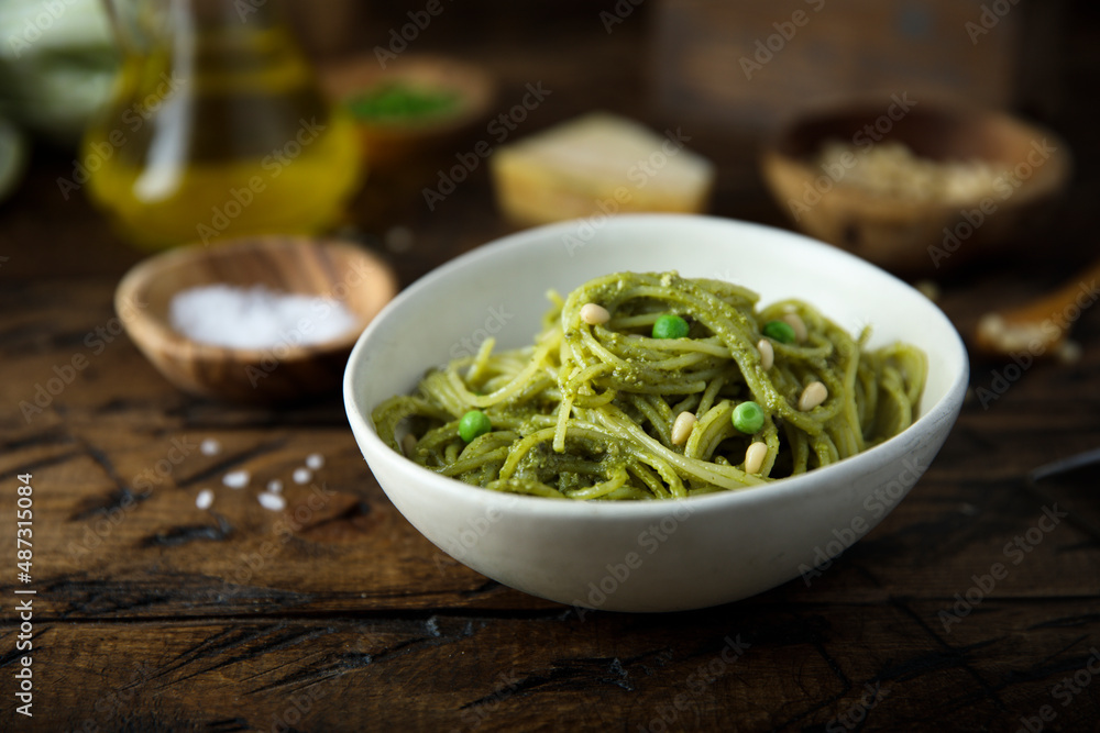 Spaghetti with pesto sauce and green pea Spaghetti with pesto sauce and green pea