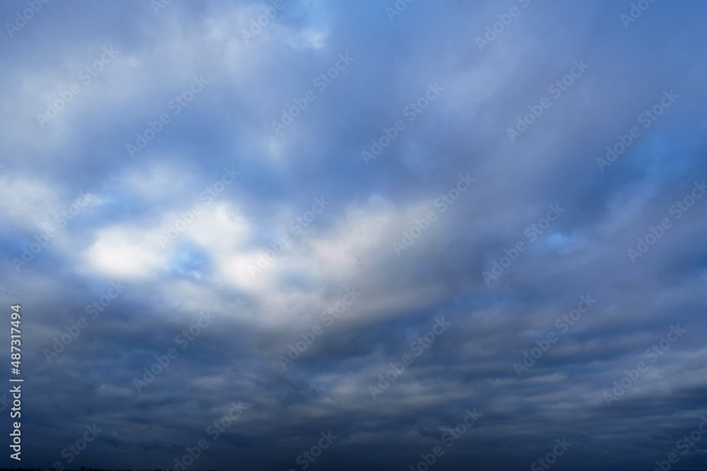 beautiful blue sky with clouds in the evening as abstract background beautiful blue sky with clouds in the evening as abstract background