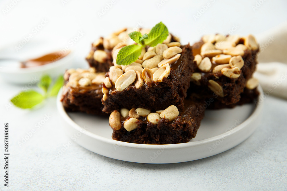 Traditional homemade brownies with caramel and peanut Traditional homemade brownies with caramel and peanut