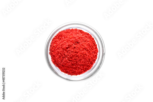 Series, spices on a white background, isolate, in different angles. Red, orange, bright paprika in a bowl