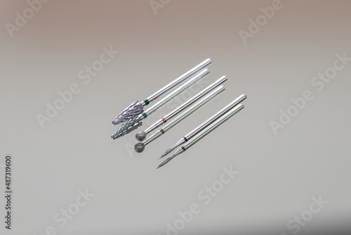 Cutters for hardware manicure and pedicure. Accessories and manicure nail tool. Milling cutter for manicure. Copy space concept.