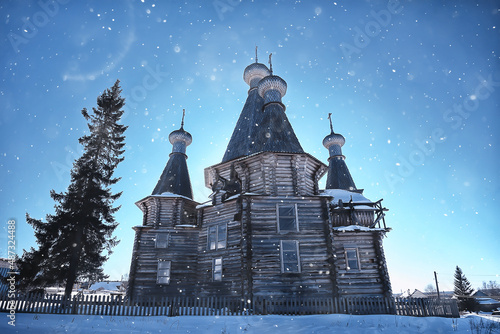 wooden church in the Russian north landscape in winter, architecture historical religion Christianity photo