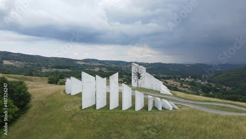 Aerial View of Kadinjaca WWII Memorial Complex on Hill in Green Landscape Above Uzice City, Serbia, Drone Shot