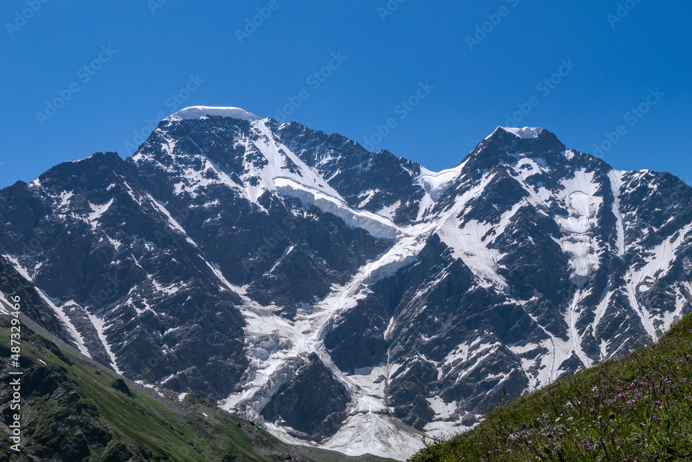 Greater Caucasus Range. Glacier Seven on mount Donguz-Orun in Elbrus region. Summer landscape Greater Caucasus Range. Glacier Seven on mount Donguz-Orun in Elbrus region. Summer landscape