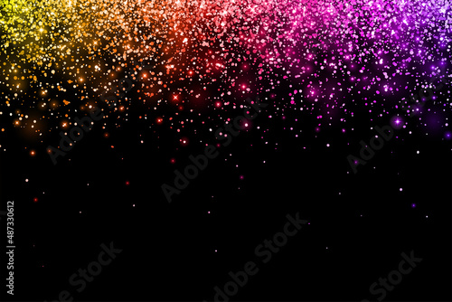 Multicolor falling particles with glow lights on black background. Vector