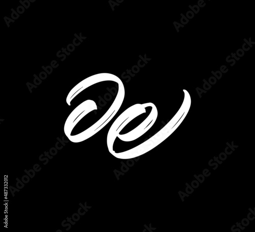 White Vector Letters Logo Brush Handlettering Calligraphy Style In Black Background Initial oe photo