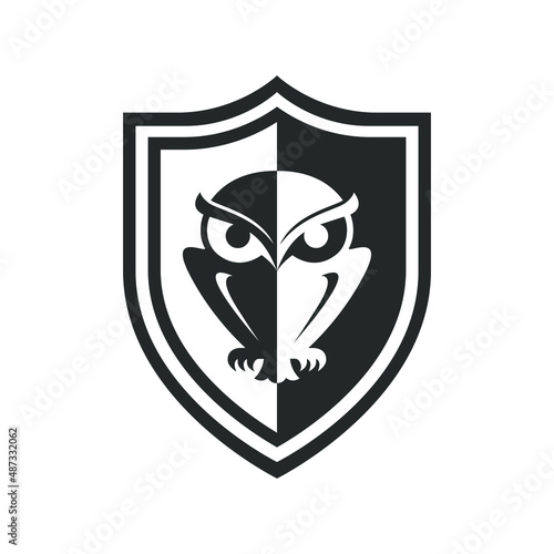 Shield with owl graphic emblem. Sign protect and security isolated on white background. Vector illustration