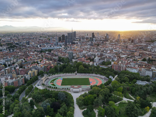 Aerial view of Arco della Pace in Milano  north Italy. Drone photography of Arch of Peace in Piazza Sempione  near Sempione park in the heart of Milan  Lombardy and Sforza Castle.