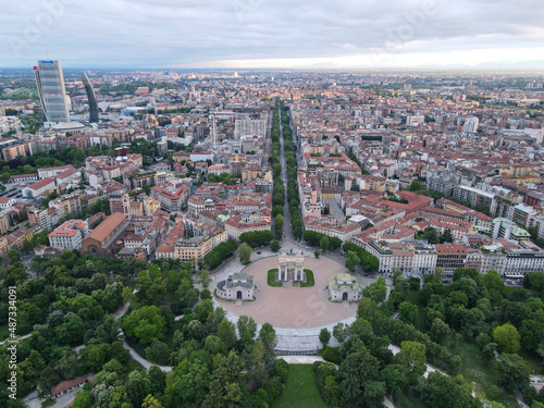 Aerial view of Arco della Pace in Milano, north Italy. Drone photography of Arch of Peace in Piazza Sempione, near Sempione park in the heart of Milan, Lombardy and Sforza Castle.