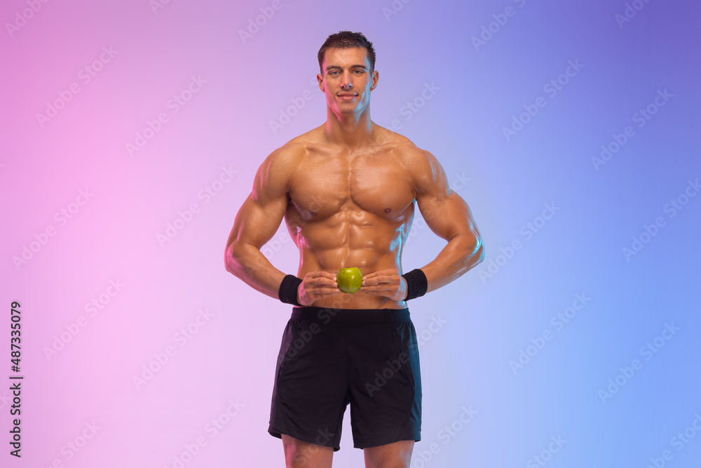 Happy man athlete with dumbbell isolated on pink background. Gym full body workout. Muscular man athlete in fitness gym have havy workout. Sports trainer on trainging. Fitness motivation.