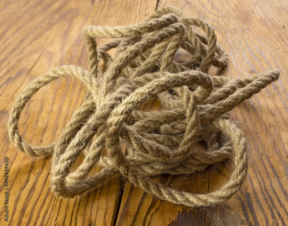 Brown nautical strong rope on the table close-up