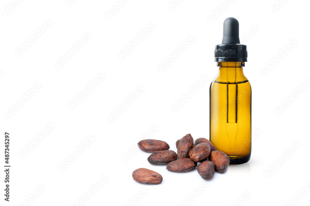 Cocoa oil in brown glass dropper bottle isolated on white background Cocoa oil in brown glass dropper bottle isolated on white background