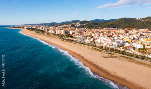Bird's eye view of shoreline and beach of Malgrat de Mar, Spain. photo