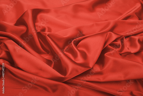 Red wave fabric silk. Abstract texture horizontal background.