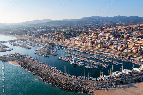 Canvas Print View from drone of town El Masnou and many boats in bay, province of Barcelona,